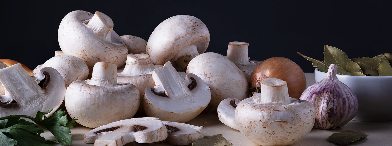 a group of mushrooms and onions 